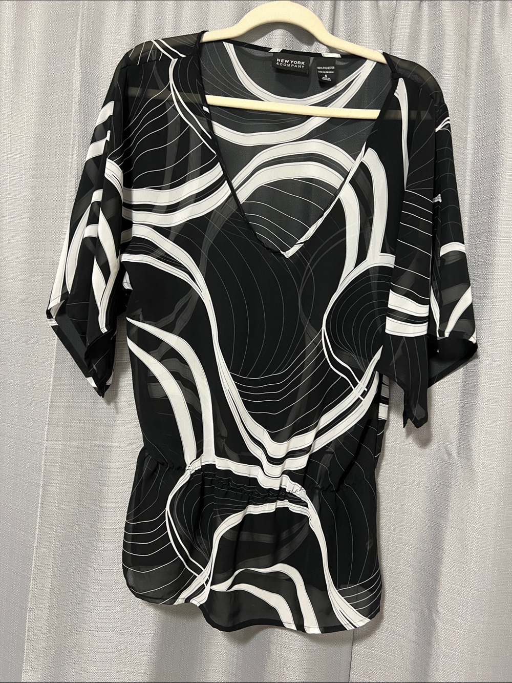 New York & Company Black and White V-Neck Peplum Blouse
